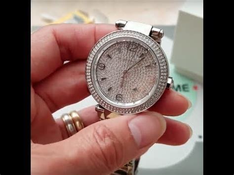 how to adjust date in michael kors watch